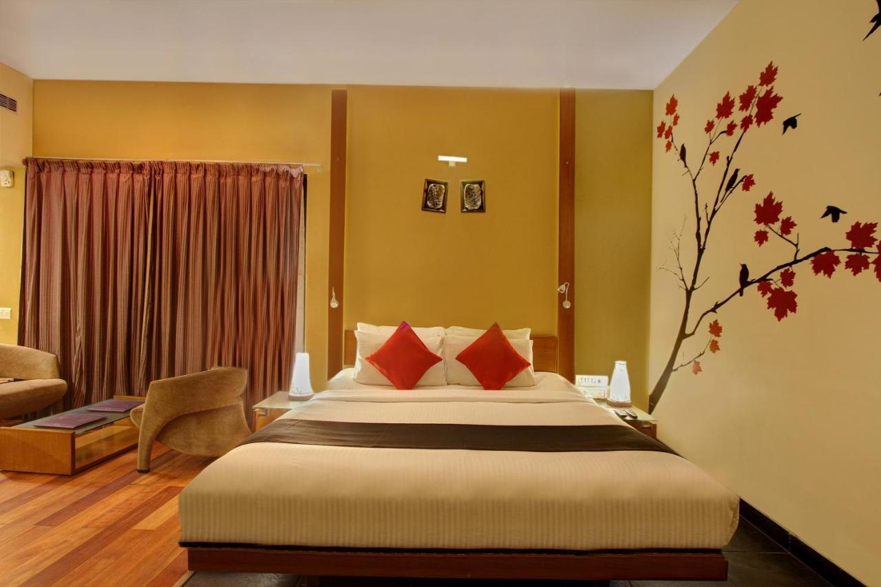 Capital O 16165 Cartier Hotel Bengaluru Szoba fotó
